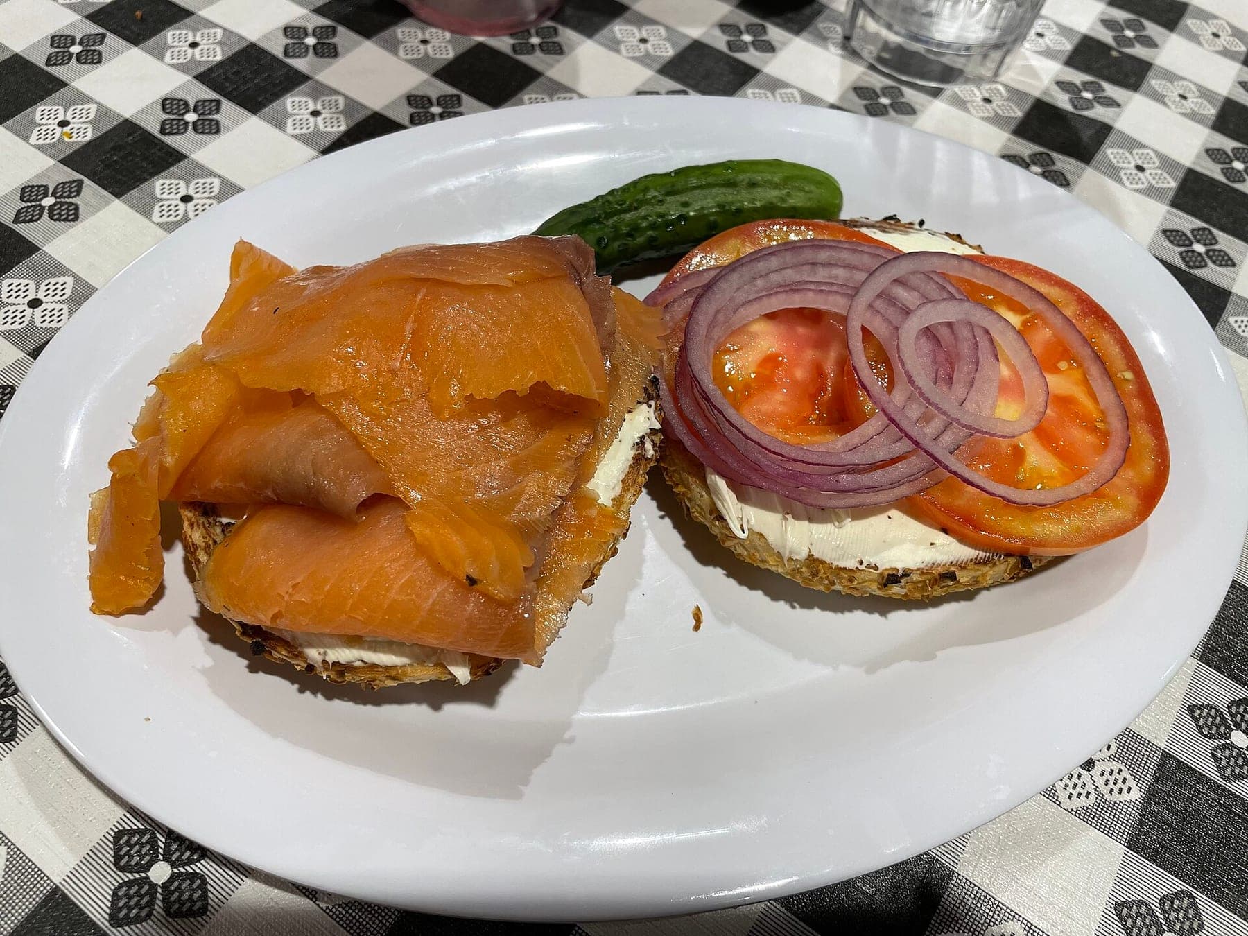 Lox Bagel Sandwich with Cream Cheese Schmear Onion Tomato